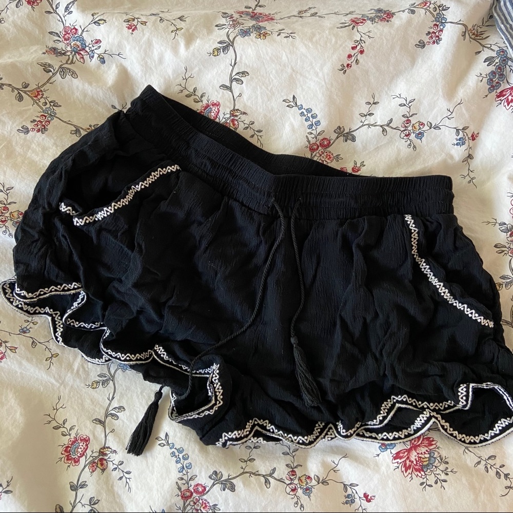 flowy airy embroidered black shorts